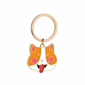Simpatico portachiavi a forma di cane Corgi in metallo smaltato con anello dorato