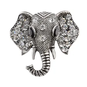 Detailed close-up of vintage elephant brooch featuring silver alloy and inlaid rhinestones
