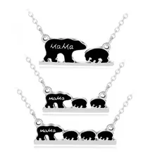 Detail of silver bear family necklace with Mama engraving and black enamel pendant finish