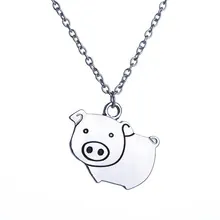 Detailed view of silver glowing hollow life tree pendant necklace with pig line art