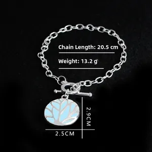 Glow in the dark Tree of Life necklace with silver chain and blue enamel pendant