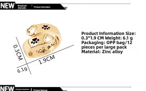 Detail view of gold heart paw ring showing 0.3cm width and 1.9cm diameter specs