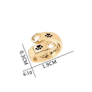 Detail view of gold heart dog paw ring showing 0.3cm width and 1.9cm inner diameter