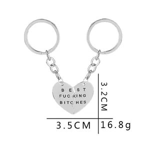 Gepolijste zilveren hart sleutelhanger set met Best Fucking Bitches gravure