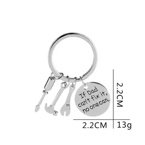 Father's Day silver keychain with tool charms and engraved inspirational metal tag