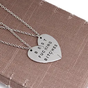 Tweedelige zilveren roestvrijstalen hartvormige ketting met Best Fucking Bitches gravure