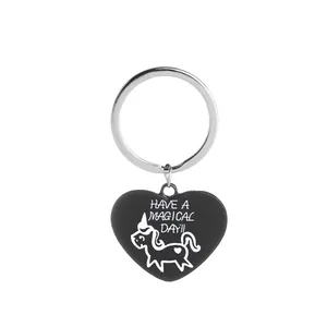 Fashionable black enamel unicorn heart keychain with Have a Magical Day engraving