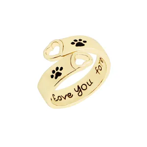 Gold open heart and paw print ring with I will love you forever engraving inside