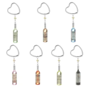 Detailed set of seven colorful resin beer bottle keychains with silver heart rings