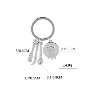 Polished silver kitchen utensils keychain with mini fork, knife, spoon and plate charm