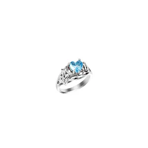 Silver MOM ring featuring a heart-shaped blue gemstone and hollowed side patterns