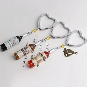 Creative resin mini beer bottle keychains with heart ring and metal sailboat charms