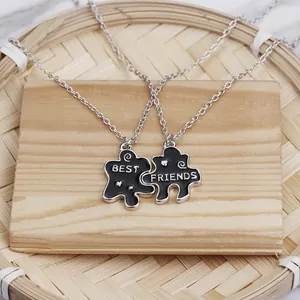 Σετ δύο κολιέ Best Friends σε σχήμα παζλ με μαύρο σμάλτο και ασημένια αλυσίδα