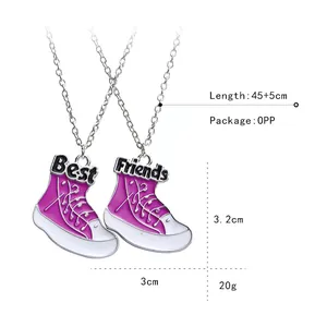 Pair of Best Friends necklaces with pink high-top sneaker pendants on silver chains