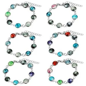 Collection of six beaded bracelets featuring assorted celestial planet glass pendants