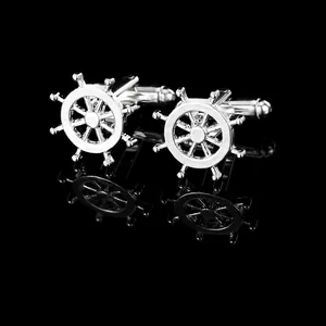 Polished silver nautical ship wheel cufflinks for men with elegant mirror reflection