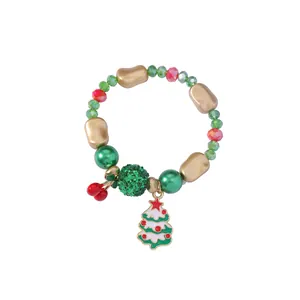 Detail of Christmas beaded bracelet with Santa tree charms and colorful festive beads