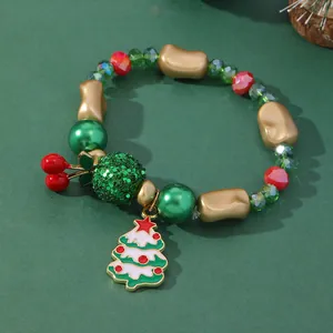 Detail of Christmas beaded bracelet with crystal beads and festive tree pendant