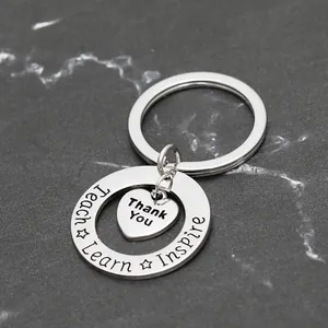 Silver stainless steel teacher appreciation keychain with heart charm and engraved rings