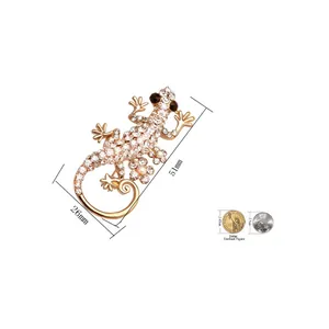 Elegante spilla a forma di lucertola con strass bianchi e riferimento misura 51mm