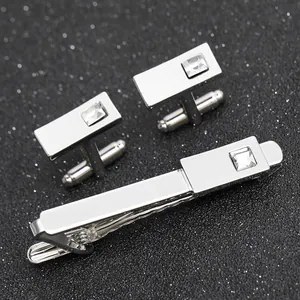 Polished silver men's business set with rectangular cufflinks and crystal tie clip