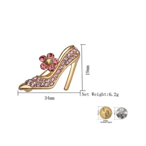 Rhinestone high heel brooch in gold alloy with pink crystals and gemstone accents