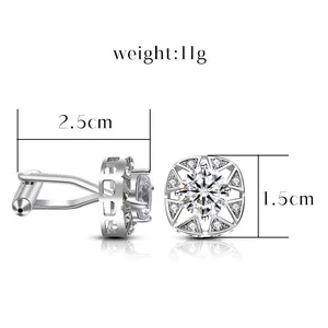 Vierkante zilveren manchetknopen met grote diamant en een modern opengewerkt frame