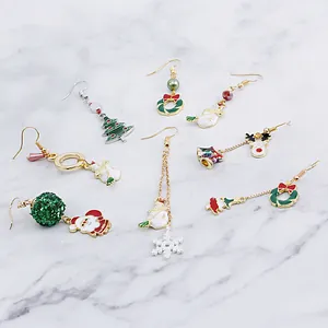 Christmas earring set with Santa Claus and Reindeer designs in red and gold finish