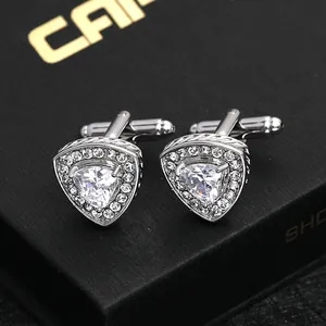 Silver triangle cufflinks with zircon stones on a luxury black gift box