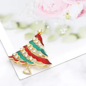 Sparkling Christmas tree brooch with red and green enamel and white cubic zirconia stones
