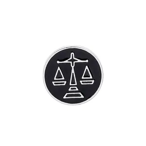 Creative Libra zodiac enamel pin badge with silver scales on a black circular background