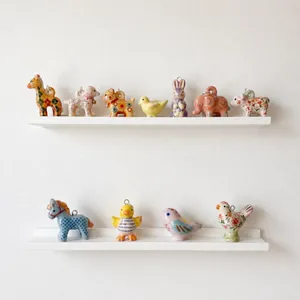 Lot de 11 pendentifs animaux en céramique colorée avec motifs floraux et anneaux métal