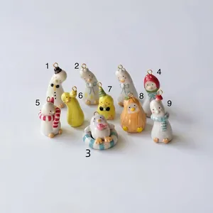 Assortiment de breloques en céramique mignonnes avec bonhomme de neige et caneton