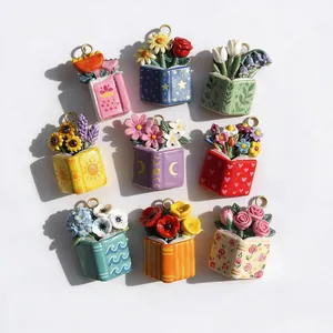 Juego creativo de 9 colgantes de libros florales con flores de resina de colores vivos