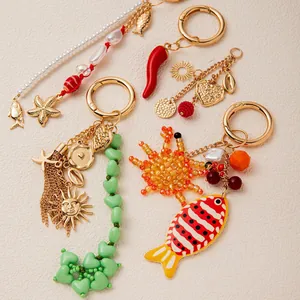 Bohemian style keychain set with starfish, heart beads and artificial pearl bag charms