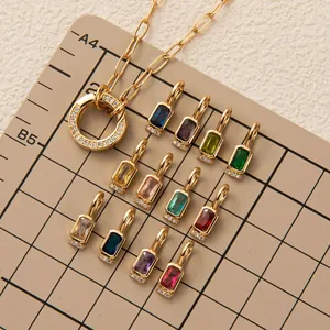 Gold paperclip chain necklace with micro-pave ring and twelve colorful birthstone charms