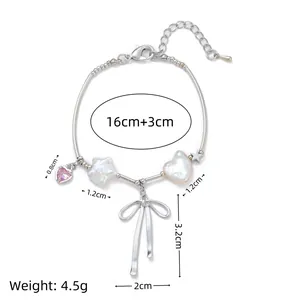 Süßes silbernes Schleifenarmband mit rosa Herzstein und Sternperlen für Damen