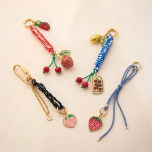 Colorful woven fruit charms with strawberry and cherry pendants for bags and keys