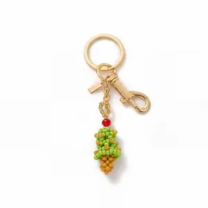 Detailreicher Perlen-Fruchtanhänger mit goldenem Verschluss für Sommertaschen