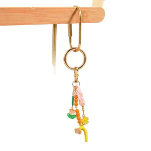 Golden 18K plated keyring with pink flowers, beads, and D-ring clasp for DIY bags