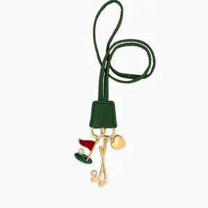 Bijou de sac golf avec cordon en cuir vert et pendentifs clubs de golf dorés