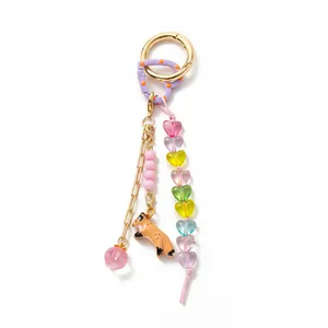 Detailed view of 18K gold-plated keychain with cute fox pendant and heart-shaped beads
