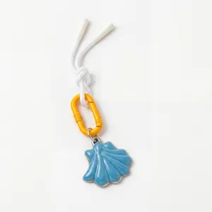 Blue shell pendant keychain with yellow carabiner and white braided cord summer accessory