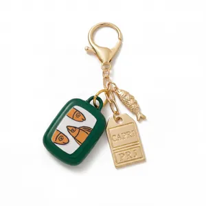 Creatieve visblik sleutelhanger met Capri gegraveerd label en kleine vis hanger