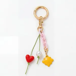Porte-clés DIY avec corde verte, pendentif cœur rouge, chaîne rose et perle blanche