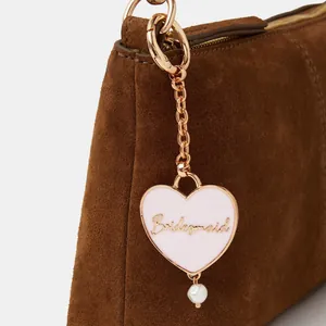 Brown suede handbag with round gold handle and pink heart Bridesmaid charm and pearl