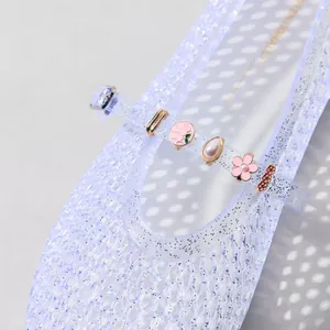 Sparkly clear jelly Mary Jane shoes with pink flowers and pearl charms decoration