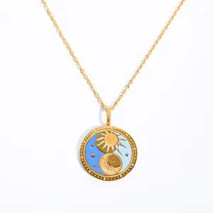 18K gold plated stainless steel sun and moon tarot pendant necklace with blue enamel detailing