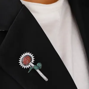 Sunflower brooch with white and red zircon on a black blazer lapel for women