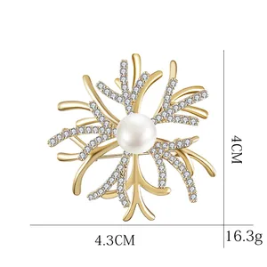Golden coral pin brooch with central pearl and sparkling rhinestones for women clothing
